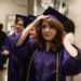 Claudia Lahr fixes her cap as the soon-to-be graduates line up before the start Pioneer's class of 2013 graduation ceremony at EMU's Convocation Center Thursday, June 6.
Courtney Sacco I AnnArbor.com 